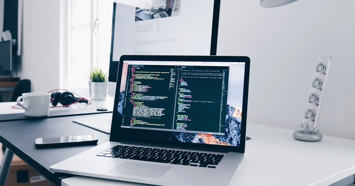 Developer planning and building a business website on a laptop